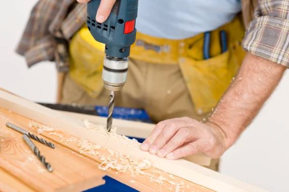 depositphotos_4695234-stock-photo-home-improvement-handyman-drilling-wood